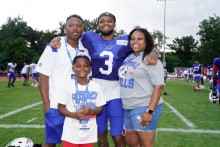 Damar Hamlin with his parents and brother