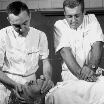 James Jude, MD, Guy Knickerbocker, PhD, demonstrate CPR on William Kouwenhoven, MD