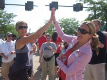Beth Sutton and Susan Koeppen celebrate the completion of a walk/run they started in November 2011