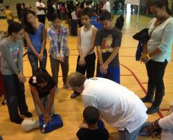 Youth learning CPR