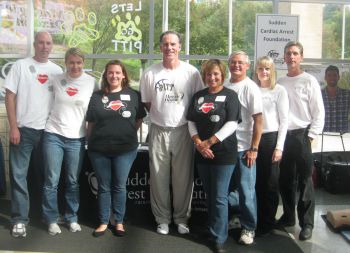 Coach Jamie Dixon, center, and SCA FDN Team