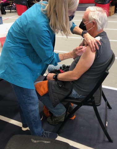 Man receiving vaccination