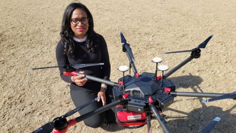 Dr. Monique Starks with drone