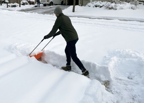 Neighbors clearing snow