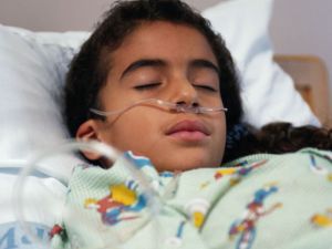 child in hospital bed