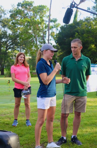 Sharon, Kaitlin and Steve Ryan at golf tournament