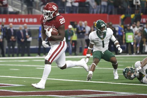 Rhamondre Stevenson of the Oklahoma Sooners, scores the winning touchdown against the Baylor Bears in the Big 12 Championship on Dec. 7, 2019. | Ron Jenkins/Getty Images