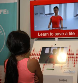 young girl watching CPR