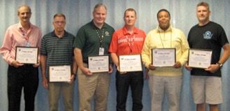 Award nominees and those who assisted them. Left to right -- New York TRACON Operations Manager Jeffrey Brooks, Controller Mike Pitt, Technician Robert Lynn, Traffic Management Coordinator Terrence Ryan, Traffic Management Supervisor Christopher Leigh, and Controller Andrew Samour display their "2nd Chance at Life" commendation awards. (Photo: FAA) Award nominees and those who assisted them. Left to right -- New York TRACON Ope