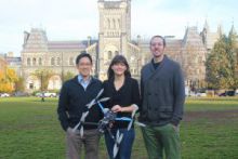 group of researchers with drone