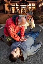 people performing CPR