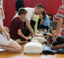 Students learning CPR