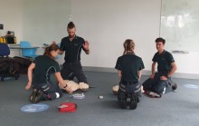 Students practice CPR